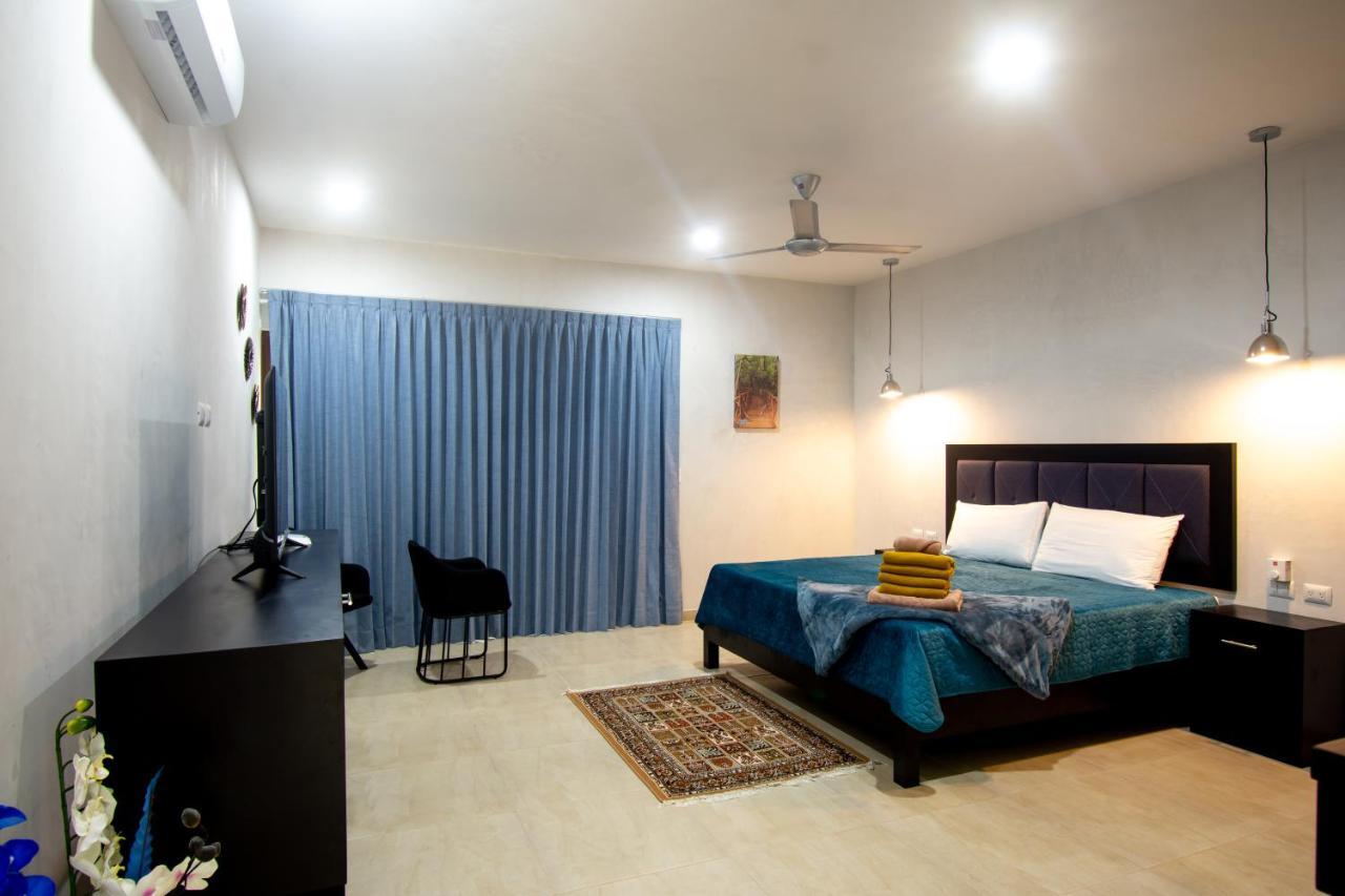 Hotel Casa Tortuga Tulum - Cenotes Park Inclusive ภายนอก รูปภาพ A bedroom in a hotel
