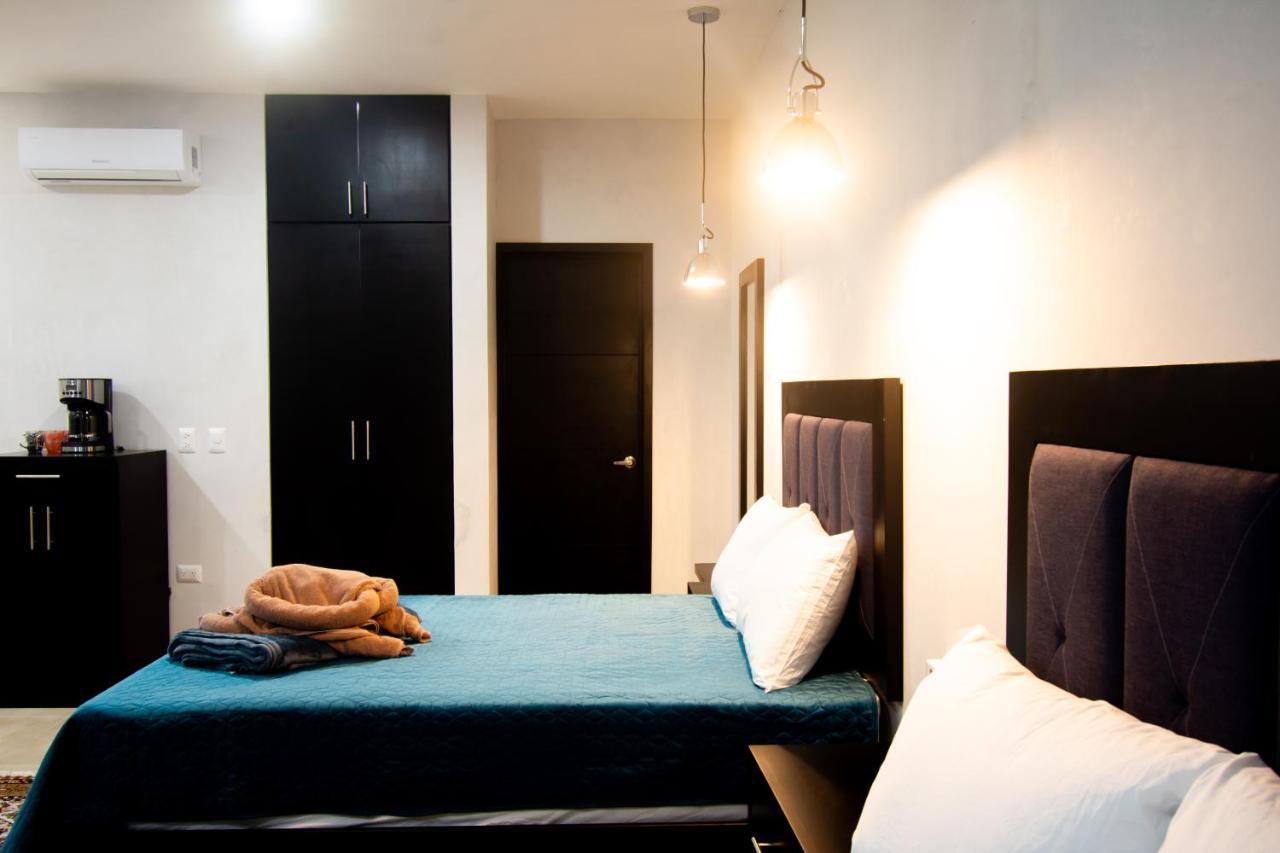 Hotel Casa Tortuga Tulum - Cenotes Park Inclusive ภายนอก รูปภาพ A bedroom in a serviced apartment in Lagos, Nigeria
