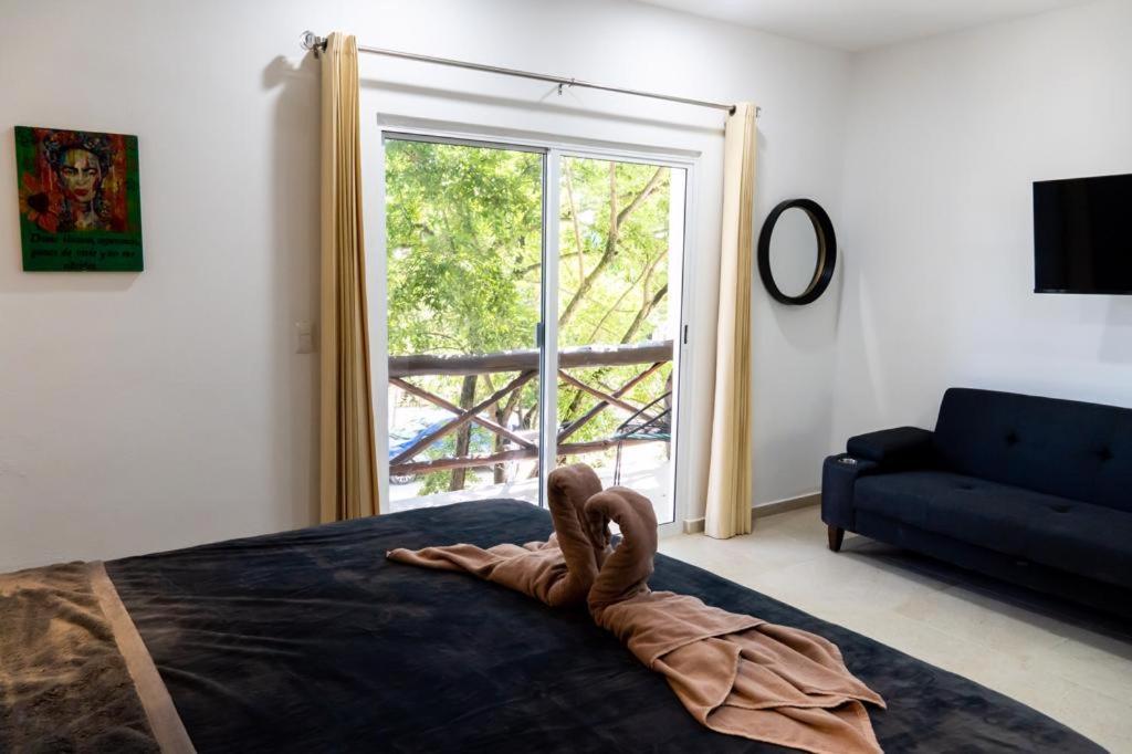 Hotel Casa Tortuga Tulum - Cenotes Park Inclusive ภายนอก รูปภาพ A sliding door