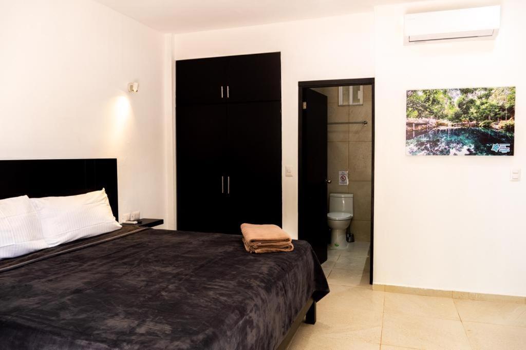 Hotel Casa Tortuga Tulum - Cenotes Park Inclusive ภายนอก รูปภาพ A bedroom in the hotel