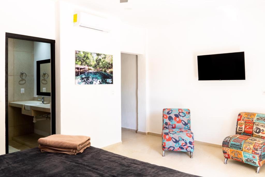 Hotel Casa Tortuga Tulum - Cenotes Park Inclusive ภายนอก รูปภาพ A room at the hotel