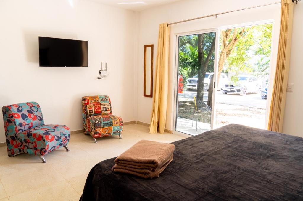 Hotel Casa Tortuga Tulum - Cenotes Park Inclusive ภายนอก รูปภาพ A bedroom at the hotel
